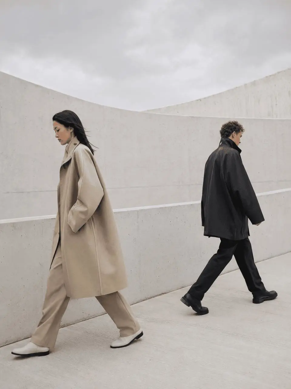 Minimal fashion campaign with two models and clean copy space