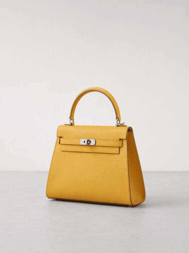 Yellow handbag source for AI product photo editing prompts