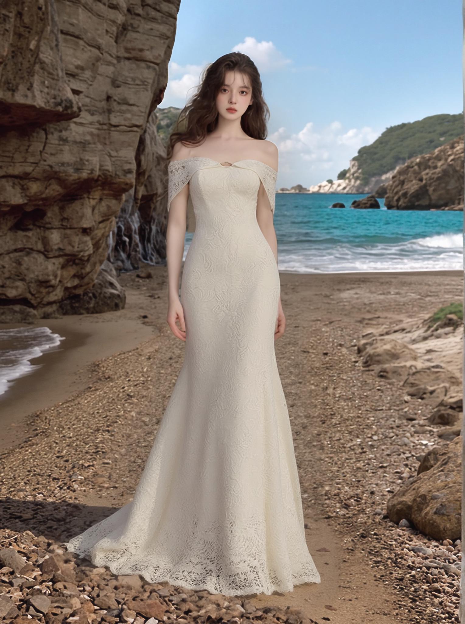 A Woman In An Elegant White Dress Stands On A Secluded Beach With The Serene Blue Sea In The Background