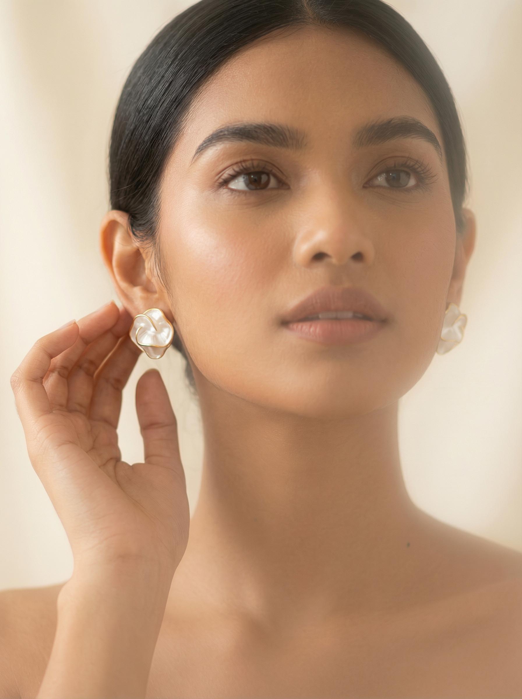 Earring jewelry photo after AI photo enhancement with crisp metalwork detail by WeShop AI