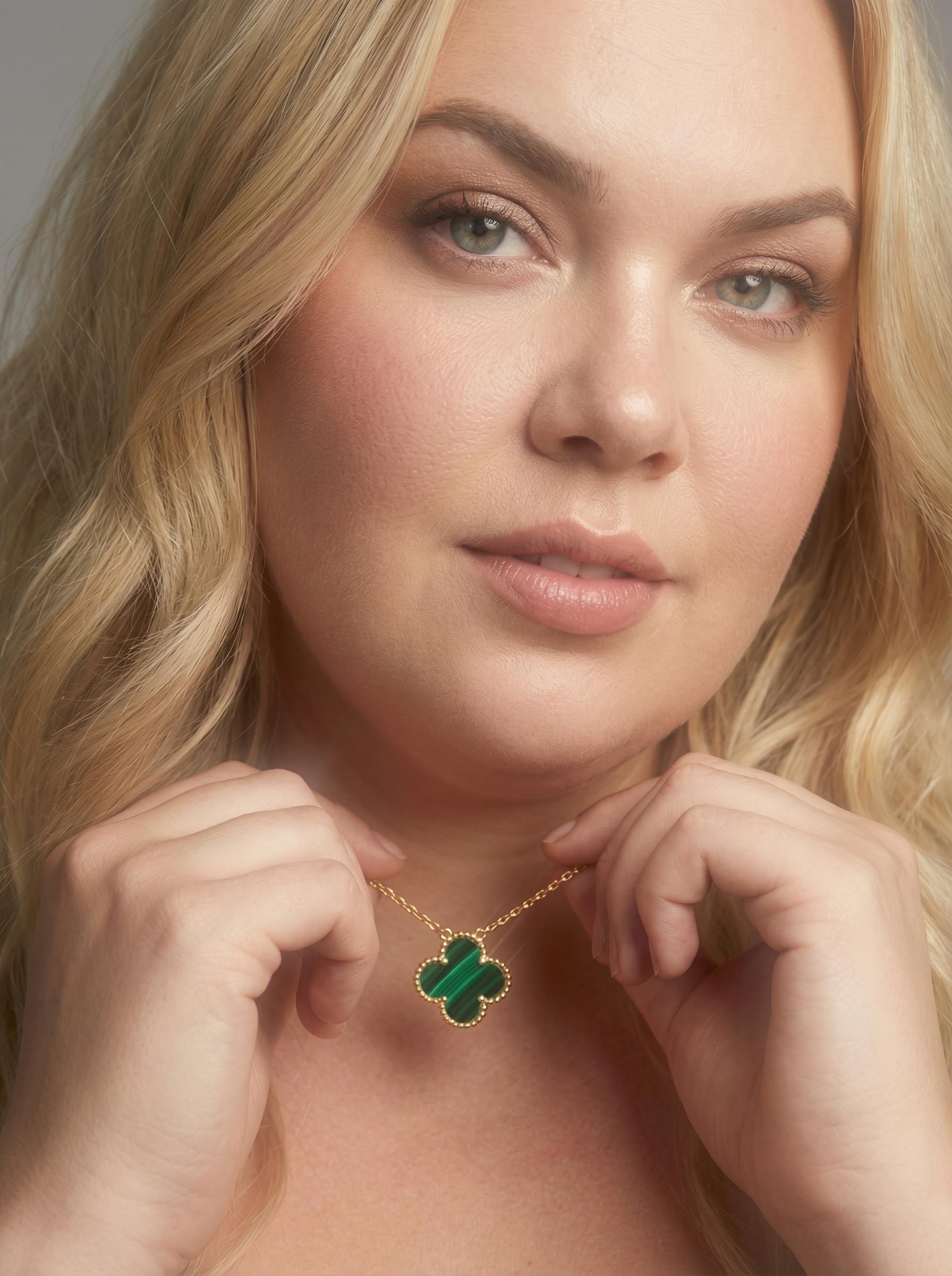 Gold necklace jewelry photo after AI photo enhancement showing fine chain links by WeShop AI